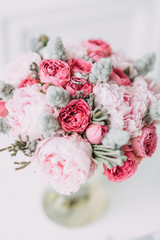 Decor and printing at the wedding. Bride's bouquet in fine art style.