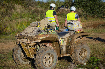 Fototapeta premium Off-road vehicles on water and mud