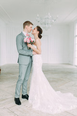 Naklejka premium Stylish wedding in St. Petersburg. Russian wedding in European style in the Studio. Fine art in photography.
