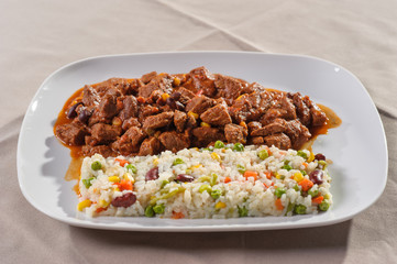 Mexican food meat, rice and vegetable 