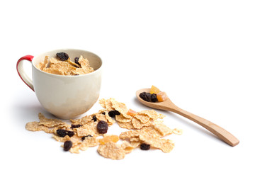 whole grain cereal flakes which mixed berry fruit and raisins for breakfast isolaed on white background