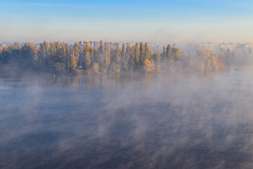 View on the Kremenchug city and Dnieper river, Ukraine in fog at autumn