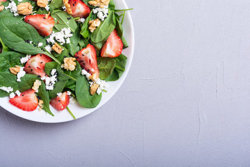 Strawberry salad with spinach , cheese and walnut