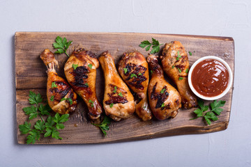 Grilled chicken legs with tomato sauce
