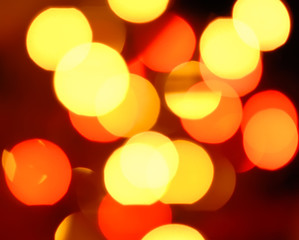 Abstract Orange And Red Bokeh Background. Blurred Lights Flares.