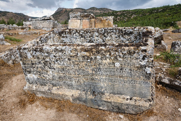 Ruins of the largest antique necropolis in city Hierapolis in terrain of Turkey