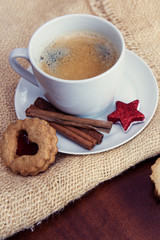 Christmas heart-shaped Cookies and coffee cup with decoration.
