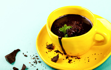 Hot Chocolate with Green Mint in Yellow Cup Drink Dessert on Colorful Background