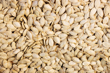 Texture of fresh pumpkin seeds. Tasty and healthy food_