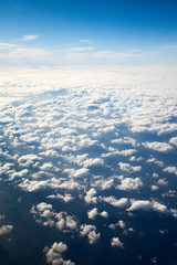 A view of the earth with clouds and the surface of the stratosphere