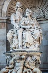 Fototapeta na wymiar Neptune and his wife Salacia fountain near Albertina and Hofburg Palace in Vienna, Austria, details, closeup