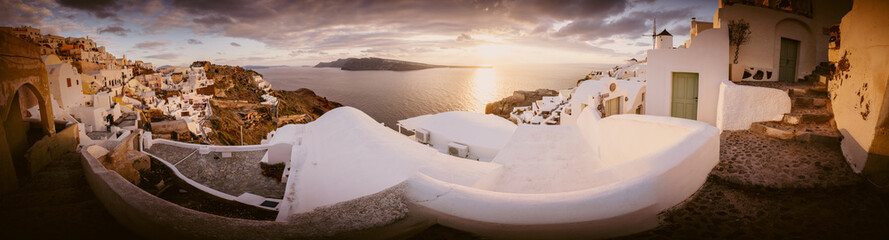Beautiful sunrise panorama of Oia town on Santorini island