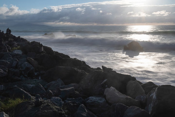 dramatic moody atmosphere on atlantic coastline in evening summertime, biarritz, france