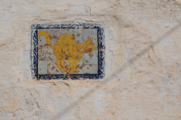 Tile on the wall of a house, Morocco