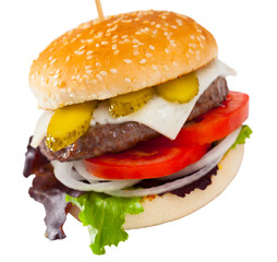 Image of burger with beef, tomato, cheese, cucumber and lettuce