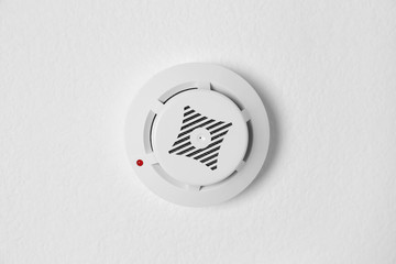 Modern alarm security system hanging on ceiling