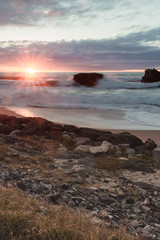 beautiful scenic beach of milady in evening summer colorful sunset, biarritz, basque country, france