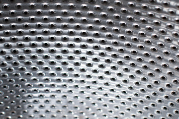 silver metallic texture with holes