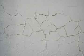 Layered Gray Wall. Multiple Traces Of Repair. Decoupling Plaster, Mortar, Cement. Painted old wall.