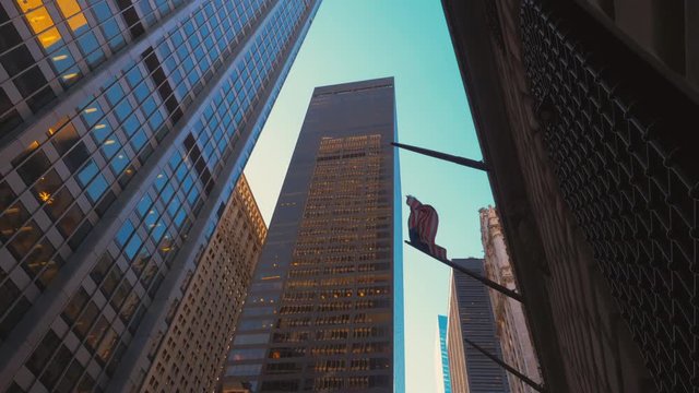 American flag waving on a skyscraper building in downtown New York, USA. 4K UHD