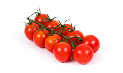 Red cherry tomato isolated on white background