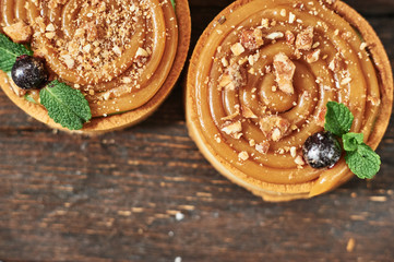 tart with salted caramel french dessert. Food industry, mass or volume production.