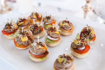 Fototapeta premium Party catering Cocktail food on a mini dish and tiny glass bowls.