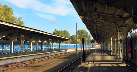Obraz premium Architecture of Old City Train Station with No Passengers and No Trains. Vintage Style Image of Empty Old Platform at Railway Station, Main Transportation Stop in St. Petersburg, Russia