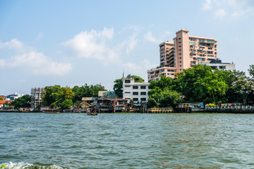 Beautiful Scenery Of The Riverfront As View From The Boat On The Chao Phraya River Bangkok, Thailand