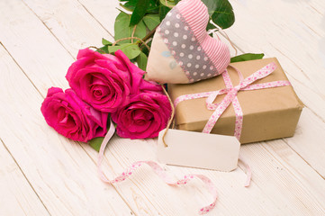 beautiful roses with gift box. happy mothers day, romantic still life, fresh flowers.