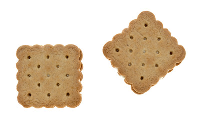 Top view of two lemon creme cookies isolated on a white background.