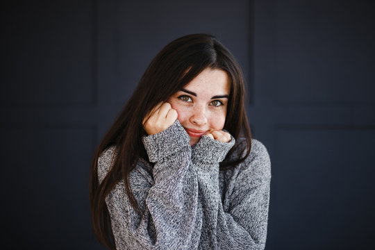 Emotions, feelings and face expression. Playful coquettish flippant childish woman portrait on dark background.