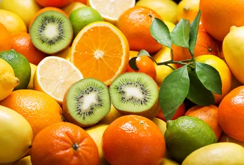 Wandaufkleber Mix aus frischen Früchten als Hintergrund © Nitr