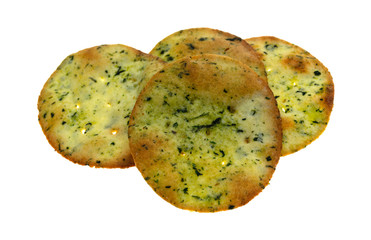 A portion of garlic and cheese flavored potato crackers isolated on a white background.