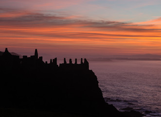 Fototapeta na wymiar Dunluce Castle Sunset Silhouette