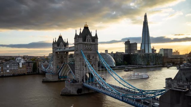 time lapse London skyline with illuminated Tower bridge in sunset time, UK
