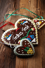 original bavarian christmas gingerbread heart on wood. xmas gingerbread cookie.