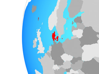 Denmark on blue political globe.