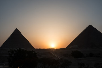 Obraz na płótnie Canvas Sunset of Giza pyramid complex at sunset time. Egypt