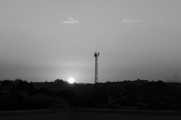 A light tower in black and white