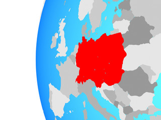 Central Europe on blue political globe.