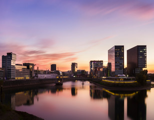 Naklejka premium Harbour of Düsseldorf (Duesseldorf) during sunset, Medienhafen