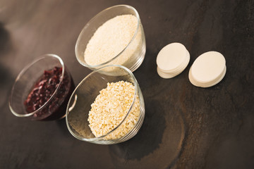 Ingredients for cranberry macaroons in small bowls