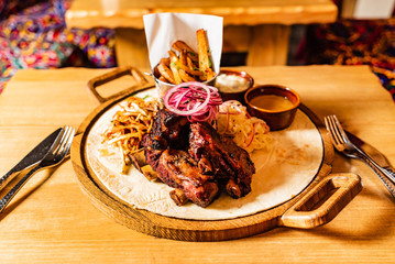 grilled ribs with french fries