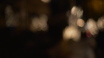 City lights bokeh with an out of focus palm for green screen