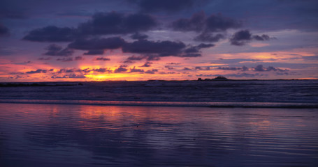 Background plate of gorgeous orange, purple and blue sunset over the ocean
