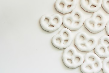 White chocolate Covered Pretzels on white background