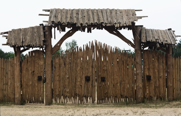 ancient wooden gate of the fort - obrazy, fototapety, plakaty