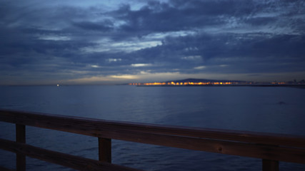 Obraz premium Background plate of Seal beach pier with a view of San Pedro just after sunset