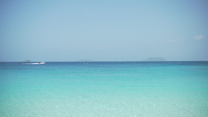 Background Plate of Boat in the distance on open blue Caribbean ocean © Mark Adams